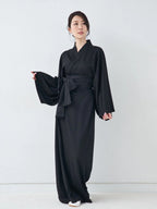 Premium Black Yukata displayed in serene Japanese interior – MikaStudio handcrafted loungewear